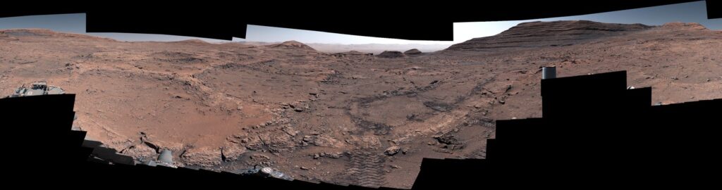 Martian terrain panorama near potential Mars habitat sites for housing on Mars.