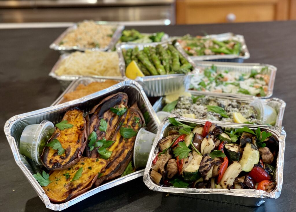 delivery vs cooking cost -typical takeout trays with fees, taxes and tip factored in